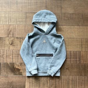 Air Jordan girls sweatshirt, size 7. Small stain on left sleeve, picture shown.